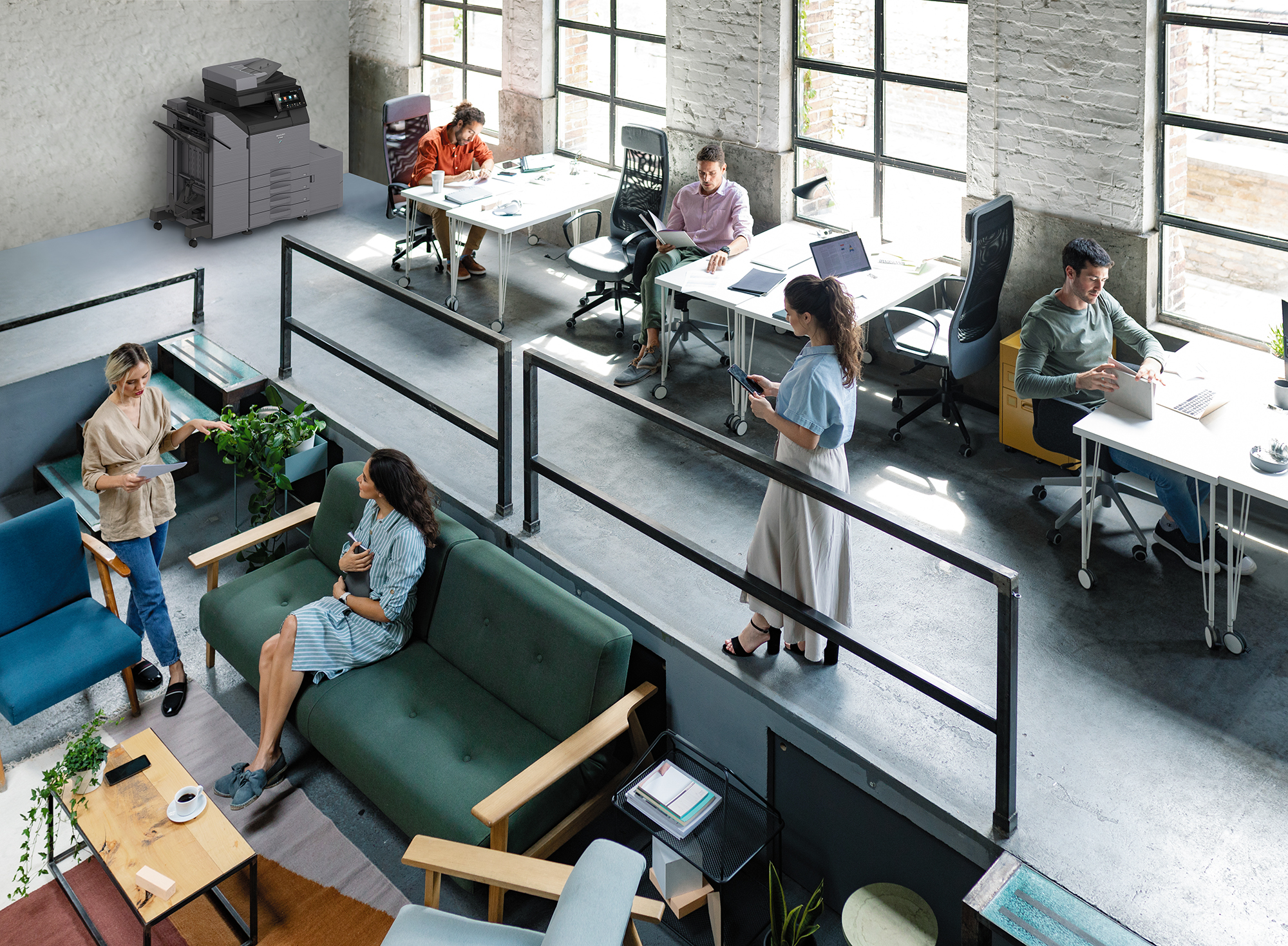 Wide Angle View of a Modern Loft Open Space Office With Businesspeople Working in It