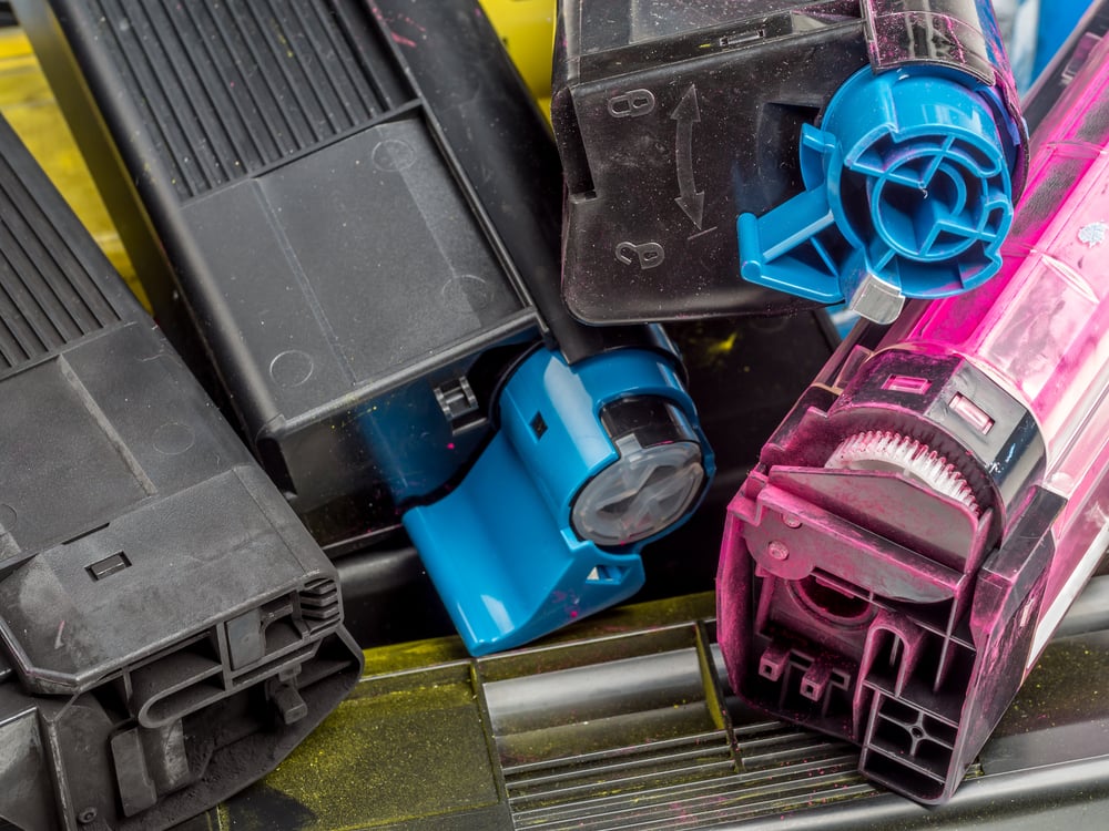 PileOfUsedColorLaserPrinterTonerCartridges