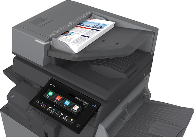 Business Copier Features That Matter the Most Multifunction office printer with a color document feeding into the output tray and a touchscreen control panel nearby.